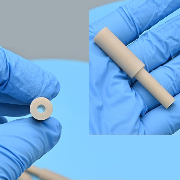 Aluminum nitride ceramic stepped tube